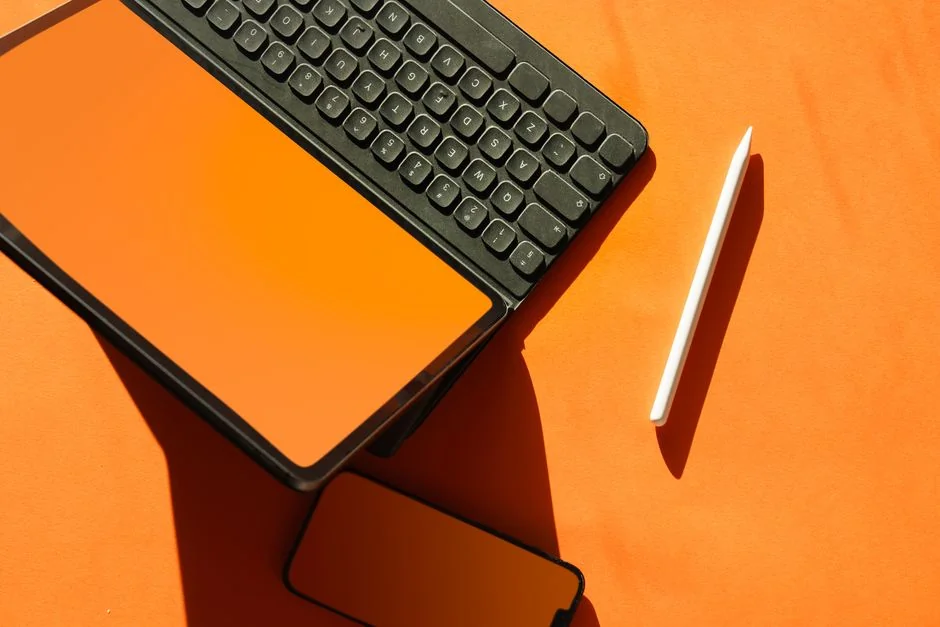 Person shopping online using a laptop and credit card, highlighting e-commerce convenience.